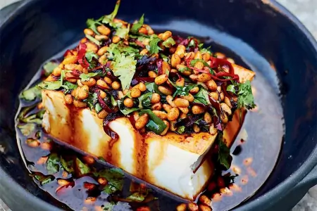 Silken tofu with pine nuts and pickled chillies